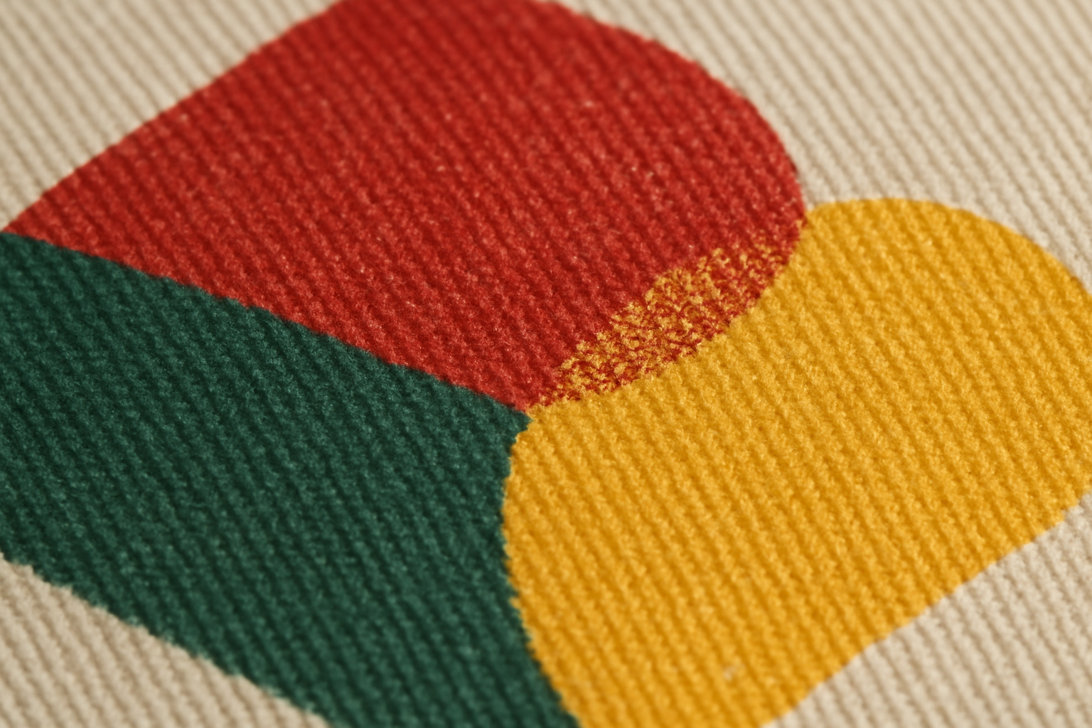 Close-up texture of screen-printed ink on a cotton twill baseball cap