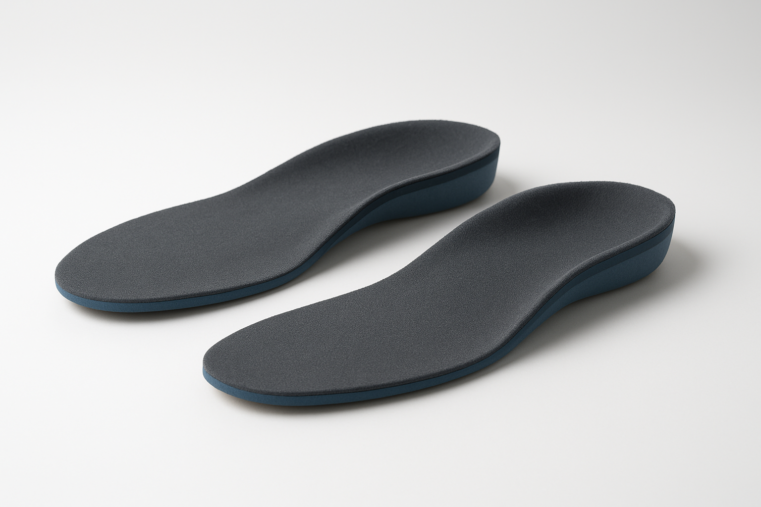 Custom full length orthotics showing heel-to-toe arch support construction
