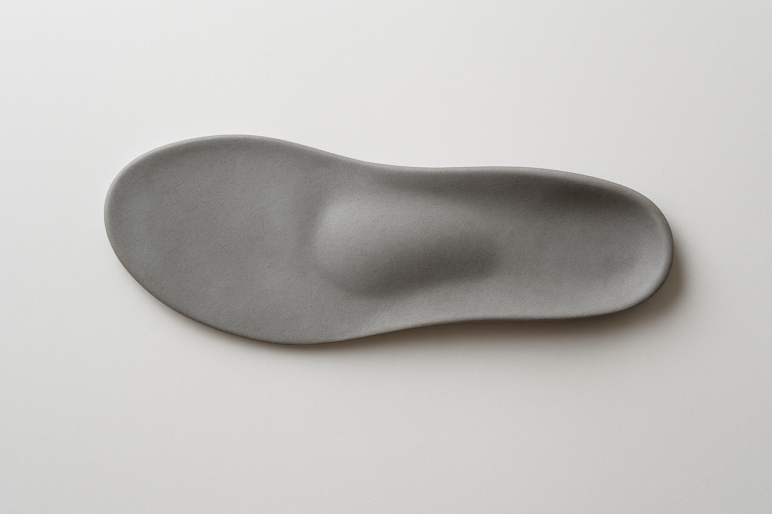 Custom sulcus length orthotic insole shown from above with forefoot support extending to the toe crease