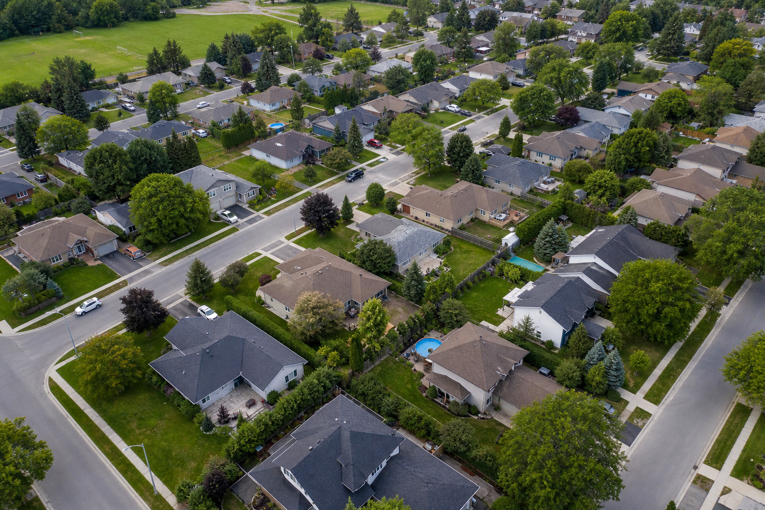 Aerial view of a suburban neighborhood used for comparable property sales analysis
